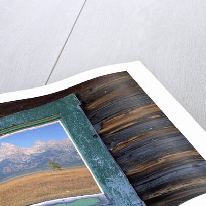 Teton Range Reflected in Window by Anonymous