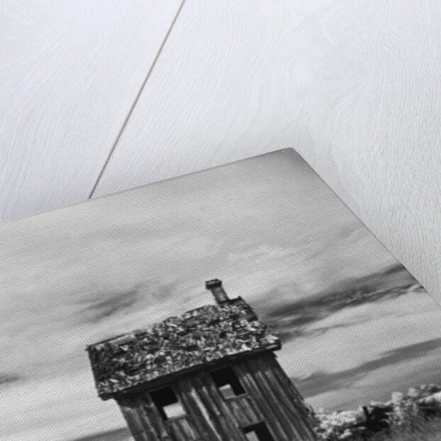 Dilapidated Leaning House by Anonymous