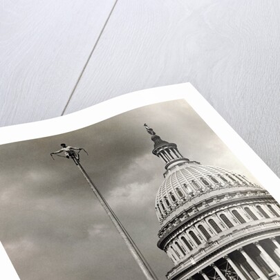 Man Sitting Near Dome of Capitol by Anonymous