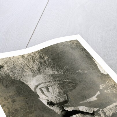 Man Hangs Onto Eye at Mount Rushmore by Anonymous