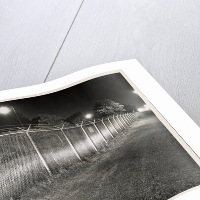Metal Fence with Barbed Wire by Anonymous