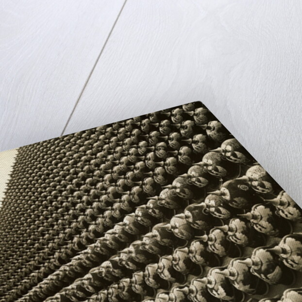 German Helmets Decorating Wall by Anonymous