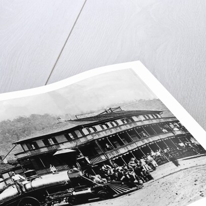 Railroad Passing Through Small Town by Anonymous