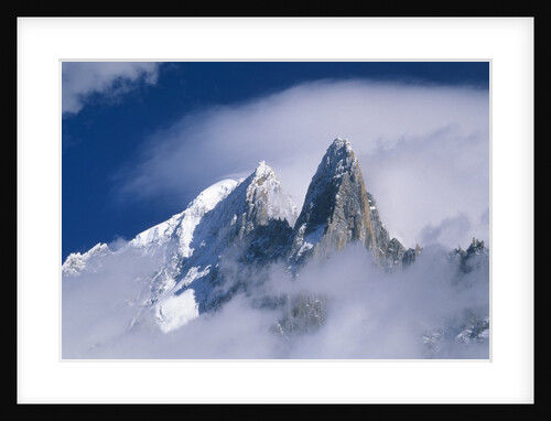 France, Alps, Mont Blanc Massif, Aiguille Verte, peak in clouds by Anonymous