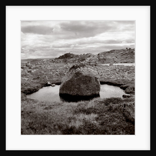 Rock in water at coast (black nad white) by Anonymous