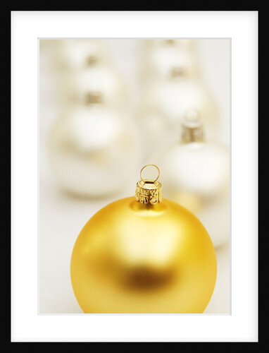 White Christmas tree decorations and a yellow one by Anonymous