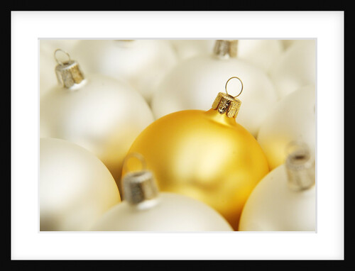 White Christmas tree decorations and a yellow one by Anonymous
