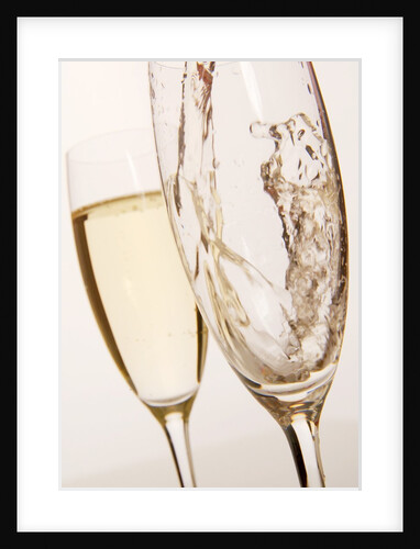 Champagne being poured into glass by Anonymous