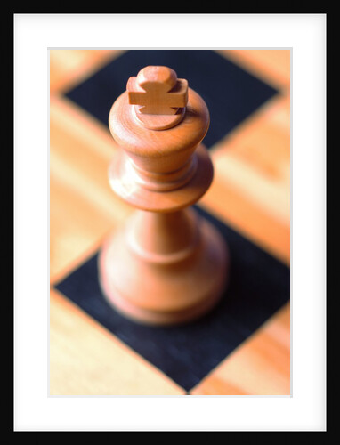King chess piece on chessboard by Anonymous