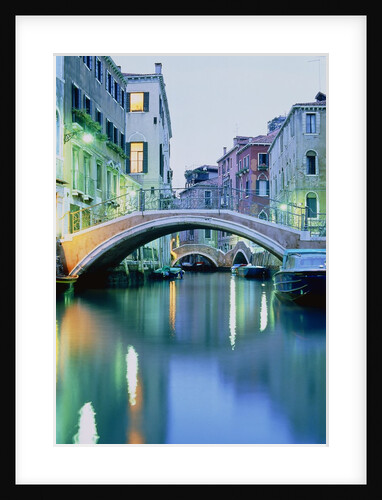 Bridge above a channel in Venice, evening shot by Anonymous
