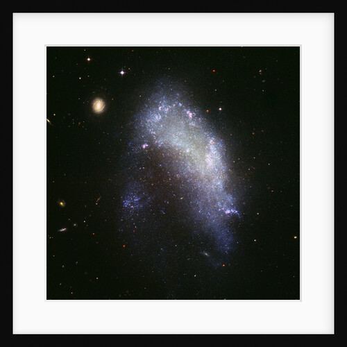 Galaxy NGC 1427A Plunges Toward the Fornax Galaxy Cluster by Anonymous