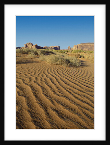 A desert against blue sky by Anonymous
