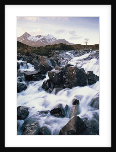 View of a river running over rocks by Anonymous