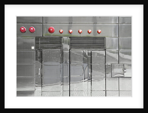 Abstract view of metal wall with red bells on it by Anonymous