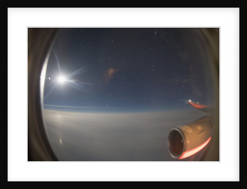 In-Flight View Above the Clouds by Anonymous