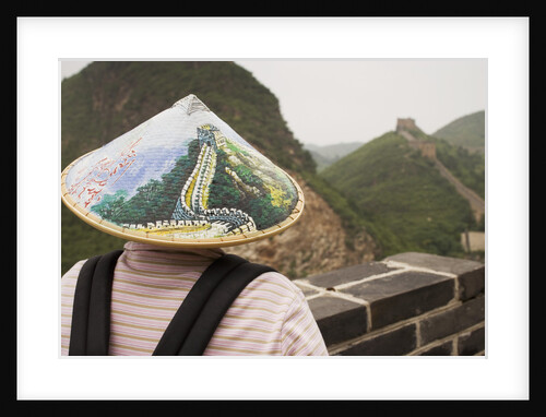 Tourist Wearing Illustrated Conical Hat on the Great Wall by Anonymous