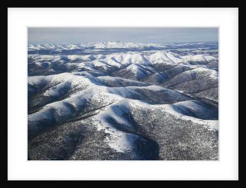 Winter Snow Covers Mountains in Alaska by Anonymous