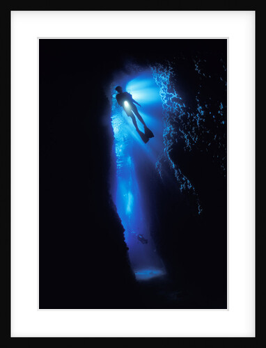 Scuba Diver in Reef Crevice by Anonymous