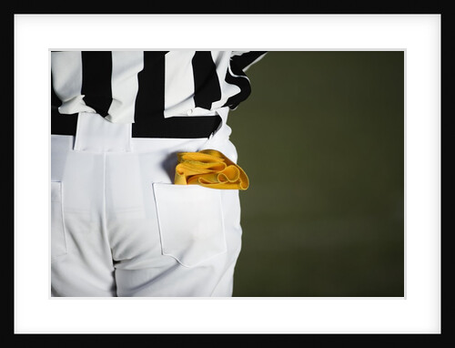 Referee with Penalty Flag in Pocket by Anonymous