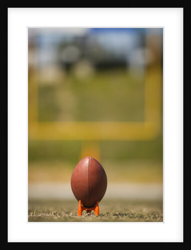 Football on Tee by Anonymous