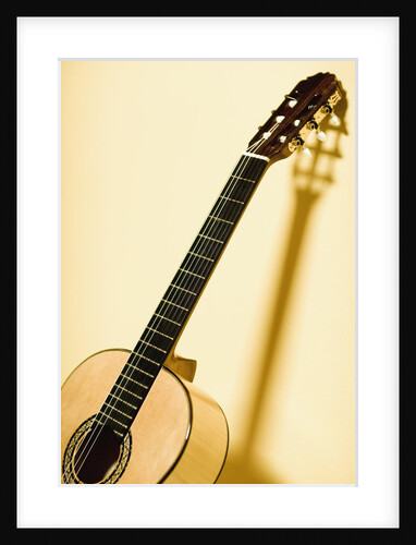 Guitar Leaning Against Wall by Anonymous