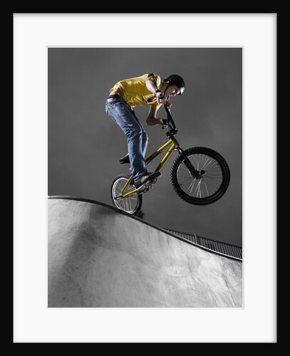 BMX Biker Performing Tricks by Anonymous