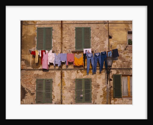Laundry Hanging Outside Windows by Anonymous