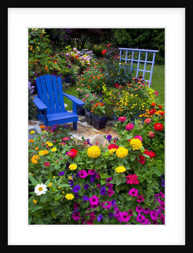 Backyard Flower Garden With Chair by Anonymous
