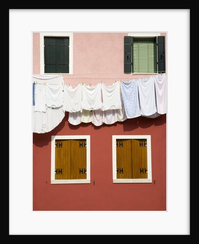 Brightly Colored House With Washing Line by Anonymous