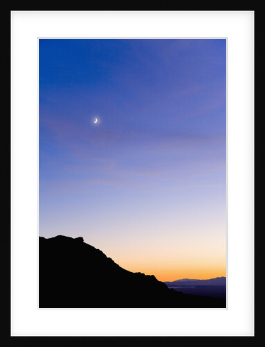 New Moon and Colorful Night Sky Above Desert by Anonymous