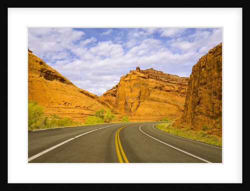 Highway Among Steep Red Sandstone Buttes by Anonymous