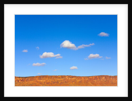 Small Cumulus Clouds Above Vermilion Cliffs by Anonymous