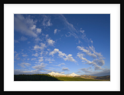 Snowy Range and Cumulus Clouds in Winter by Anonymous