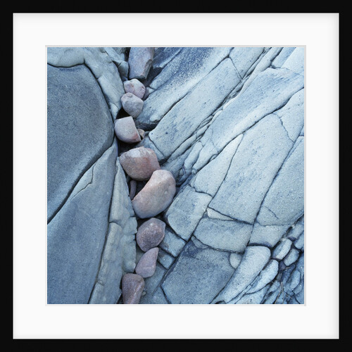Rocks Against Cracked Boulder by Anonymous