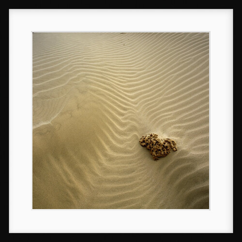 Rock Eroding in Desert Sand by Anonymous
