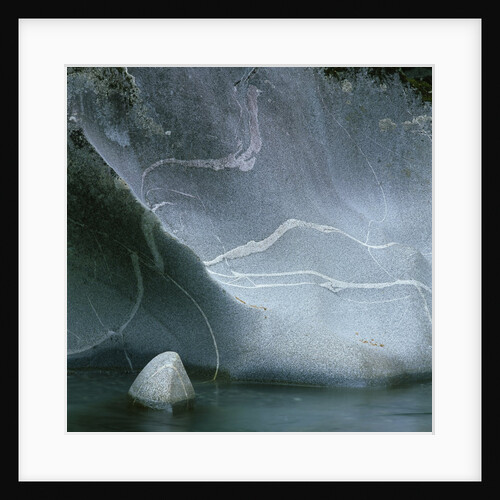 Strata in Riverbank Rock Formation by Anonymous