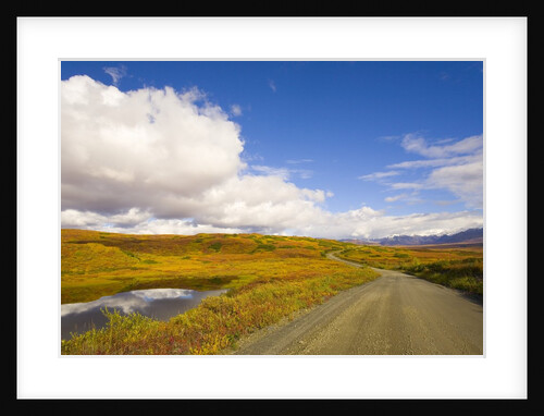 Clouds Above Autumn Tundra and Gravel Road in Alaska by Anonymous