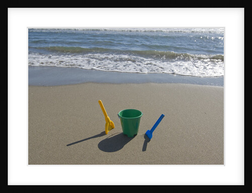 Toy Shovels in Sand by Anonymous