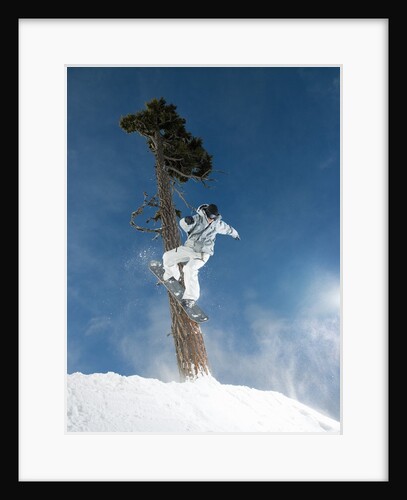 Snowboarder Mid-Air During Jump by Anonymous