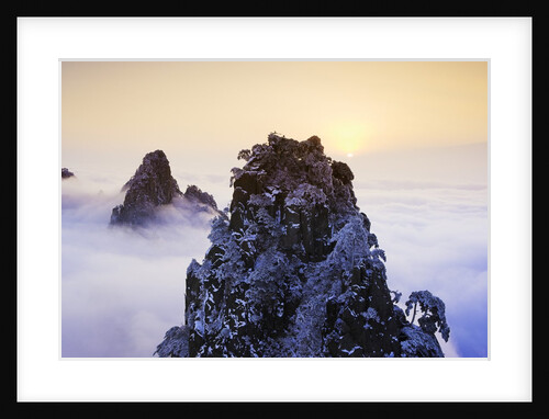 Mountain Peaks Above Clouds by Anonymous
