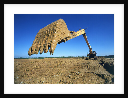 Backhoe Working in Muddy Field by Anonymous