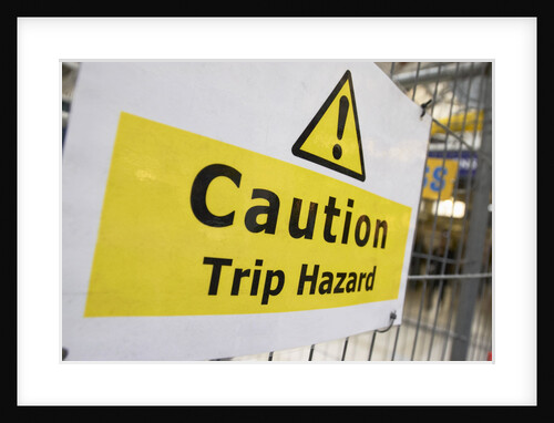 Caution Trip Hazard Sign on Construction Site by Anonymous