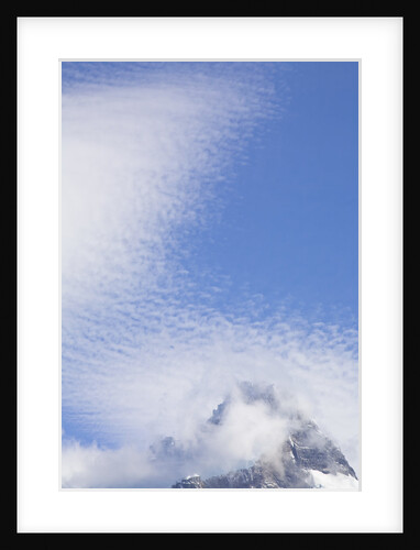 Cirrocumulus Clouds Above Rocky Crags by Anonymous