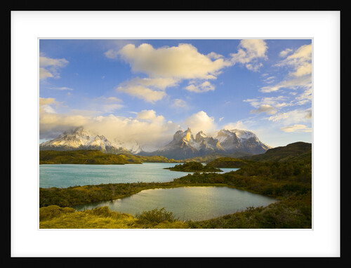 Mountains Shrouded in Clouds near Lake by Anonymous