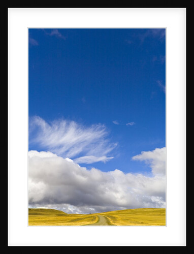 Clouds above Rural Road by Anonymous