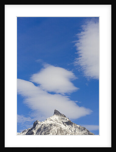Clouds and Snowy Mountain Peak by Anonymous
