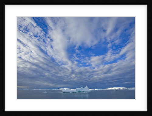 Clouds Above Sea and Snow-covered Coast by Anonymous