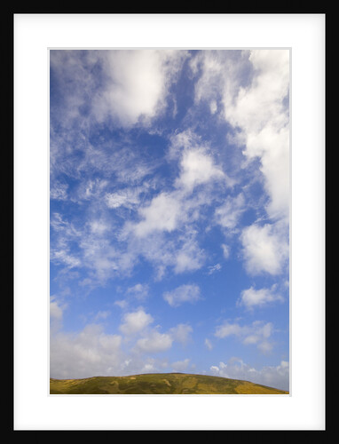 Cumulus Clouds above Hill by Anonymous