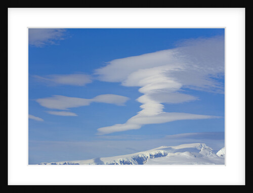 Lenticular Clouds Floating above Snow-covered Glacier by Anonymous