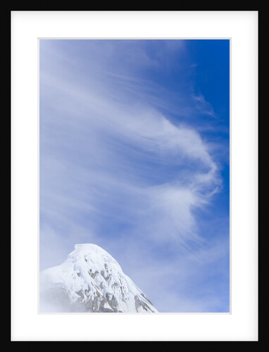 Cirrus Clouds Floating by Snow-capped Mountain Peak by Anonymous